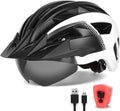 Adult bike helmet with visor and goggles, rechargeable rear light, mountain road.